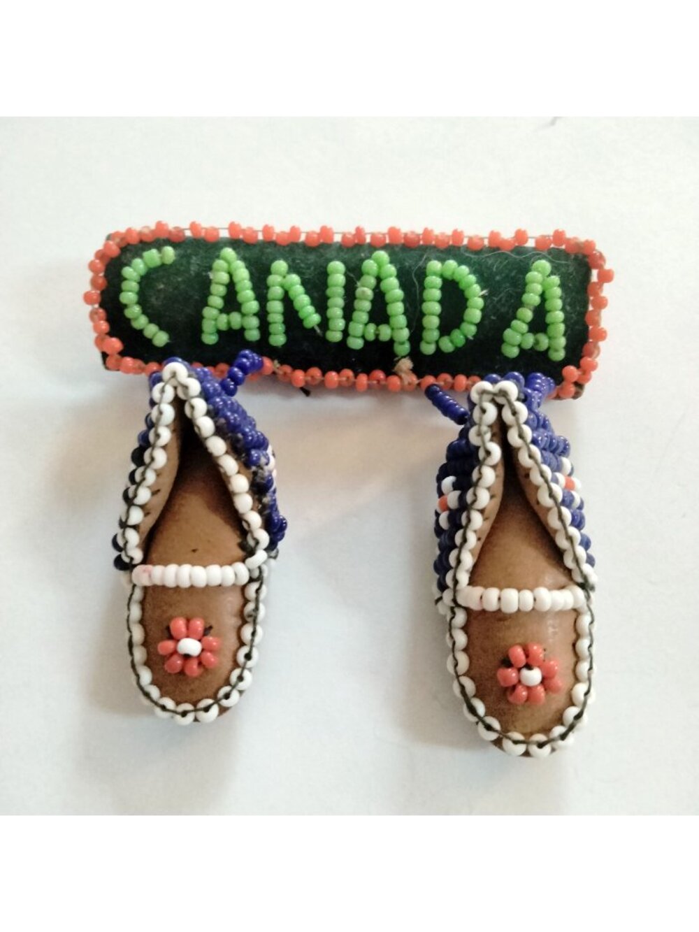 Handcrafted Beaded Moccasin Canada Pendant Design